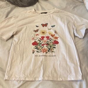 Medium tee with butterfly and flower graphic